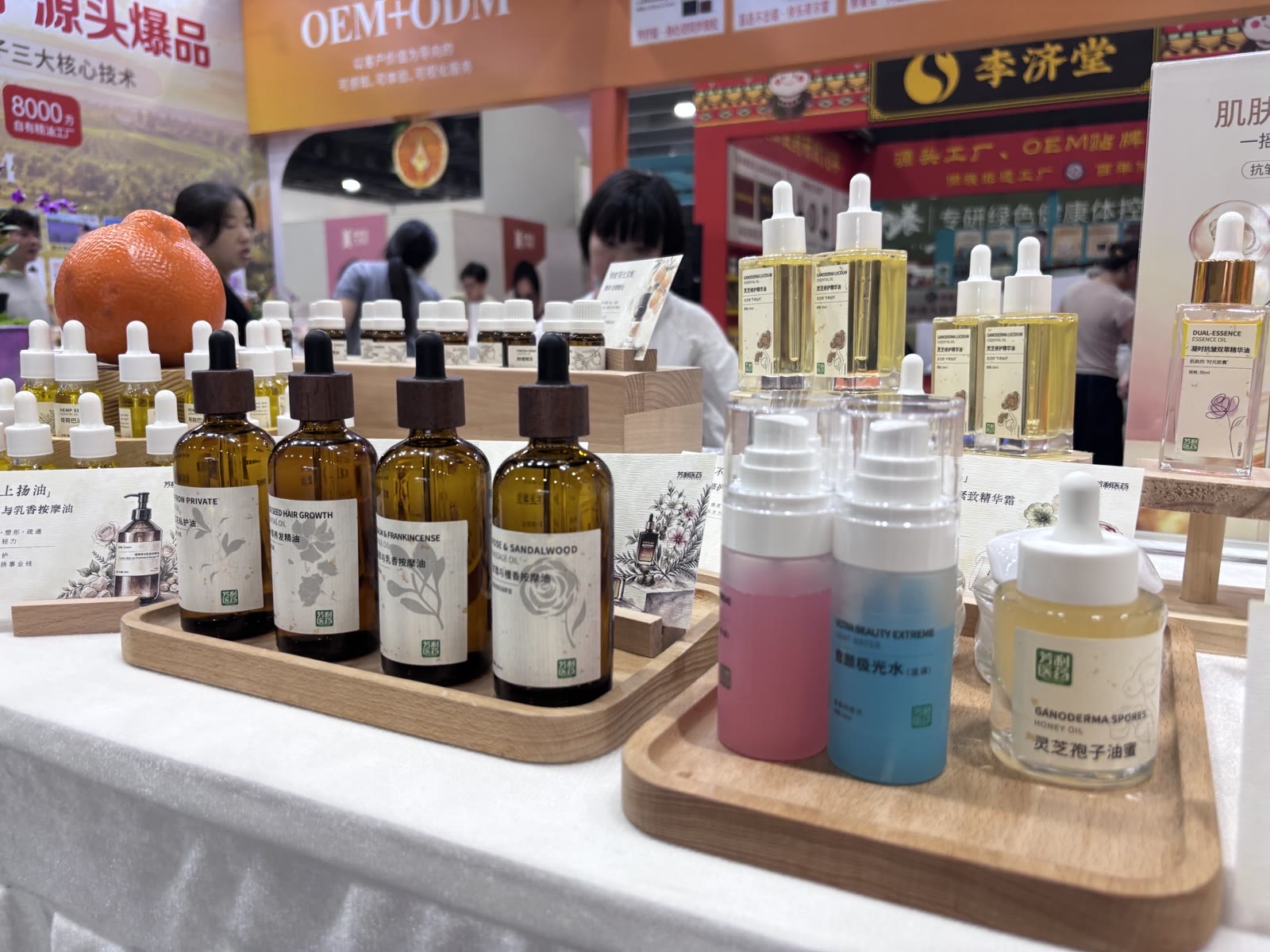 FairyAroma essential oils and serums displayed at a beauty trade show stand